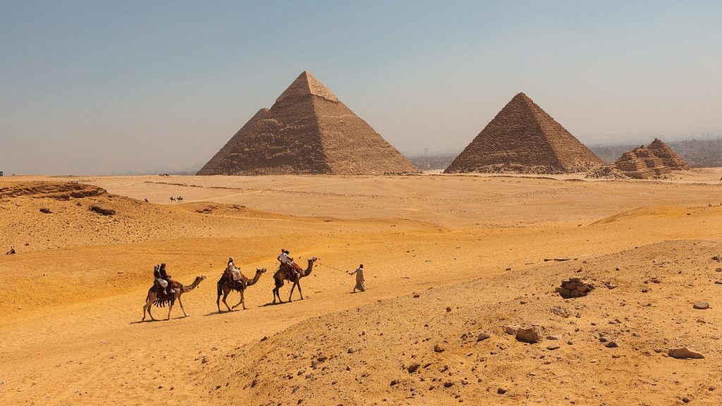 Giza Pyramids Egypt Camels Desert Landscape Photo by Ludovic Delot Bravo